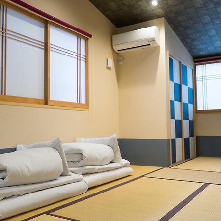 Guesthouse Zennichi Киото Экстерьер фото