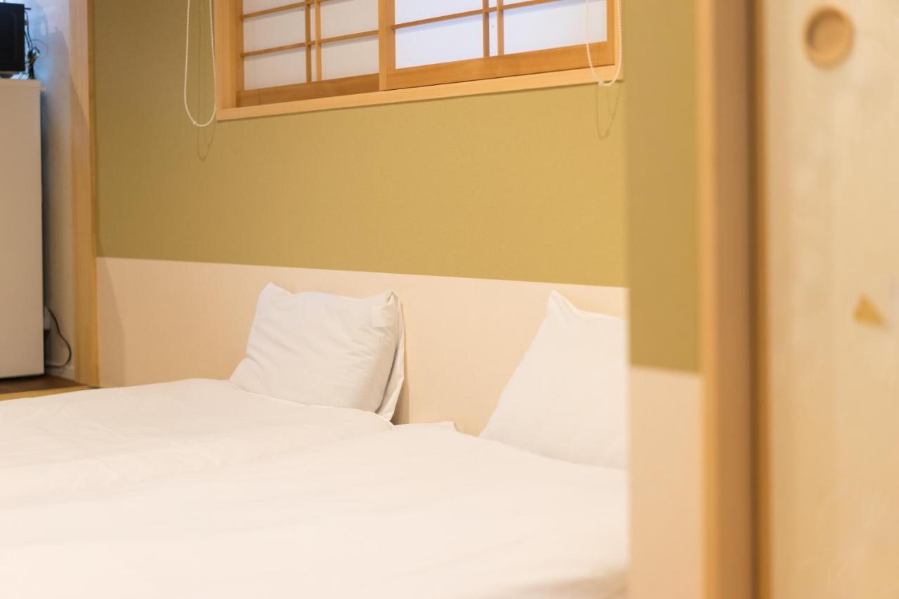 Guesthouse Zennichi Киото Экстерьер фото