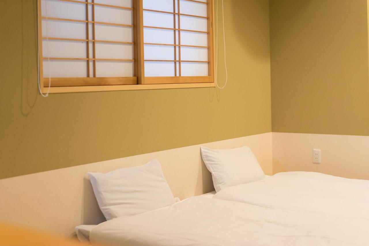 Guesthouse Zennichi Киото Экстерьер фото