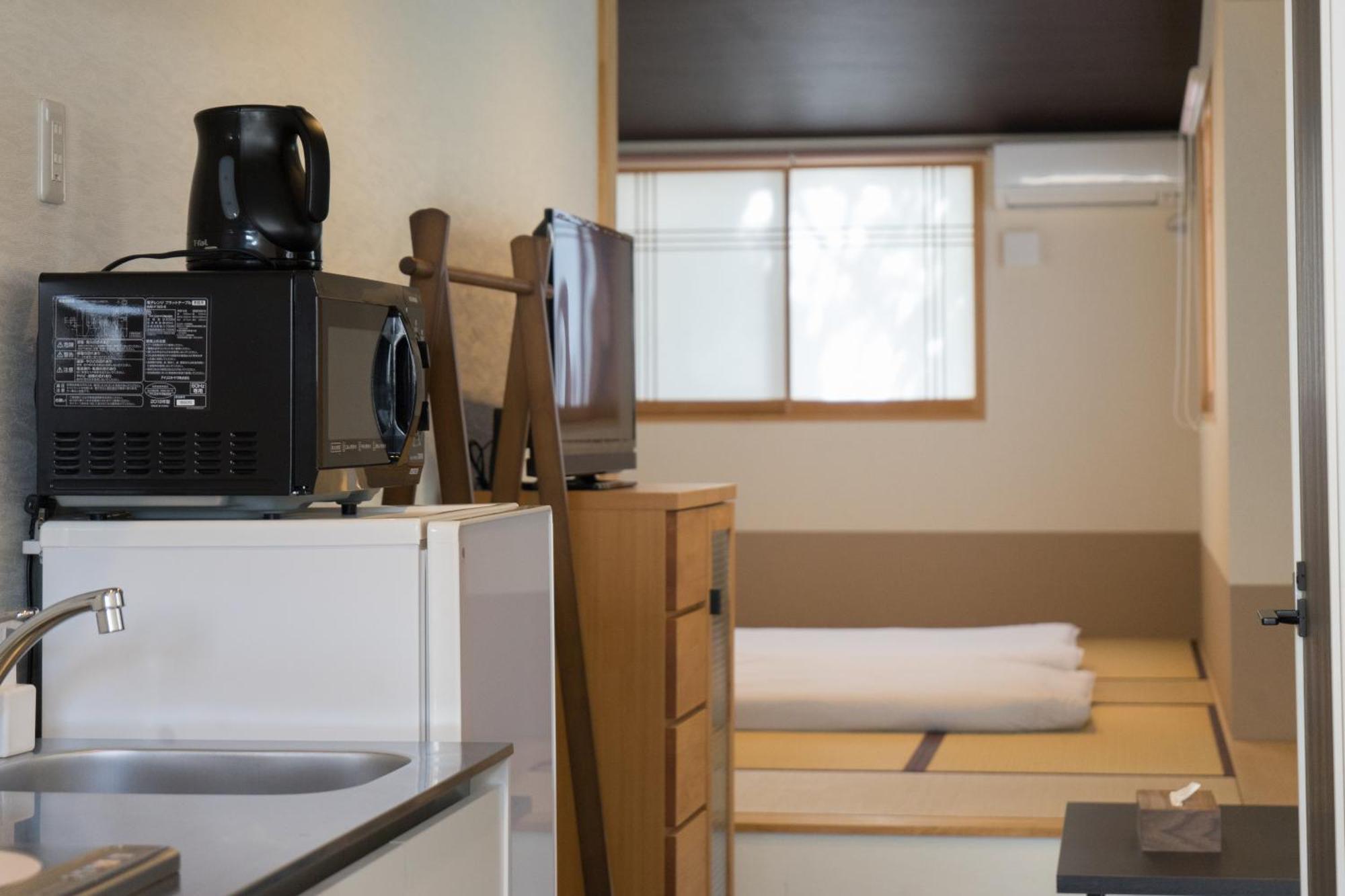 Guesthouse Zennichi Киото Экстерьер фото