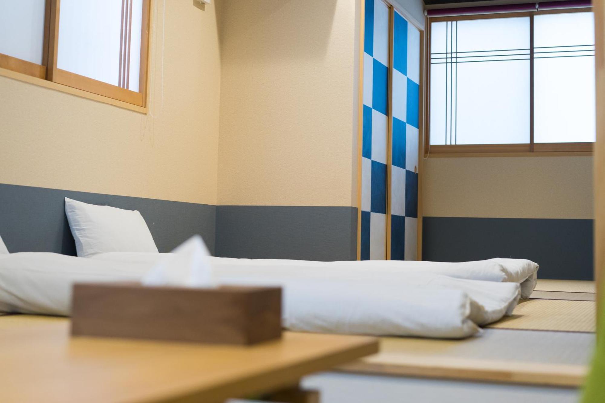 Guesthouse Zennichi Киото Экстерьер фото