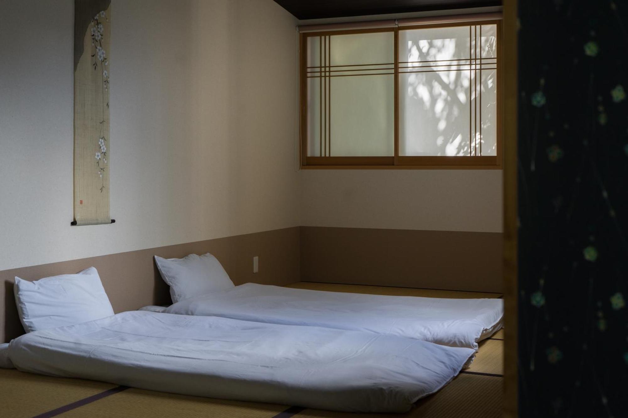 Guesthouse Zennichi Киото Экстерьер фото