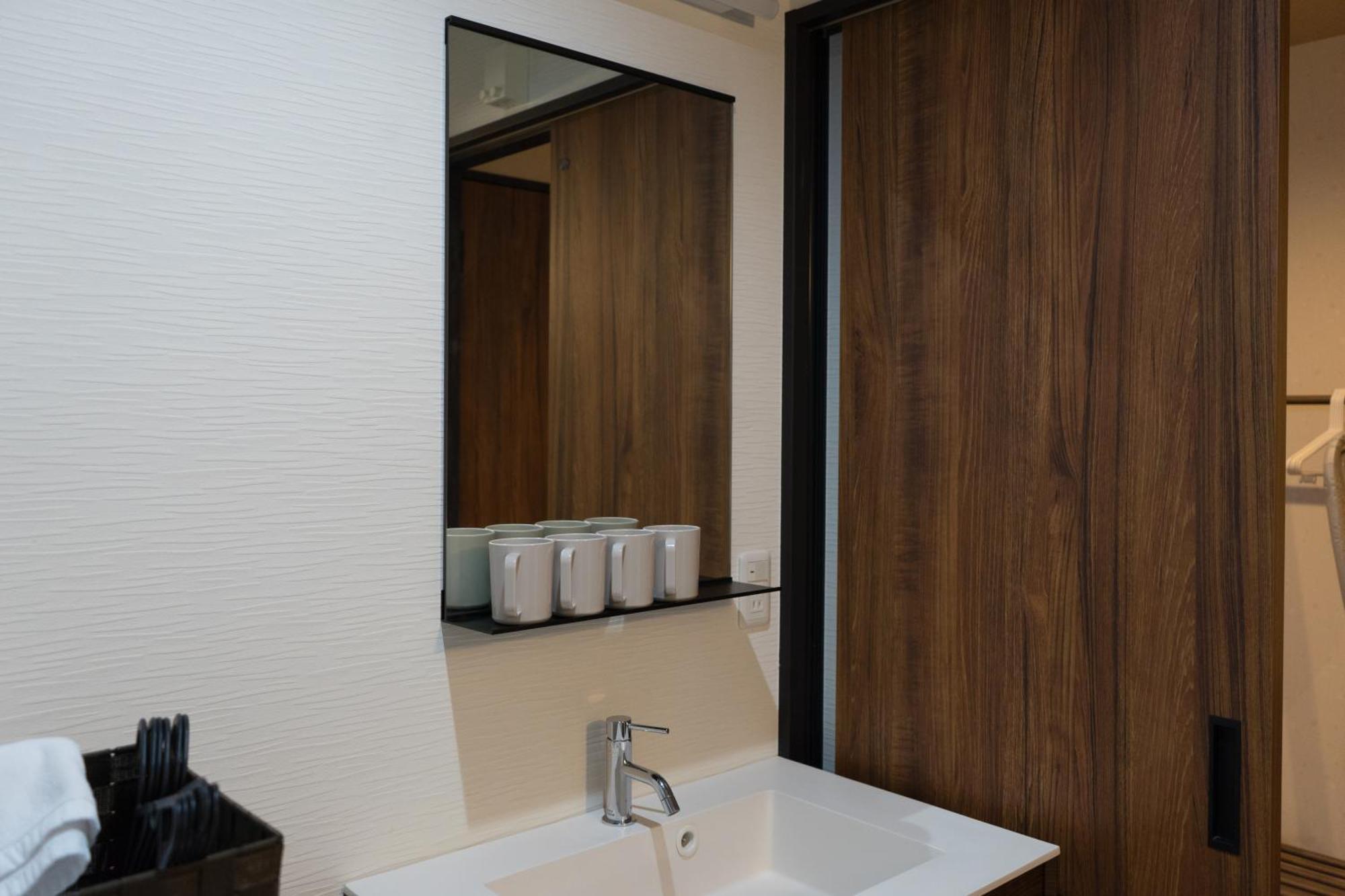 Guesthouse Zennichi Киото Номер фото