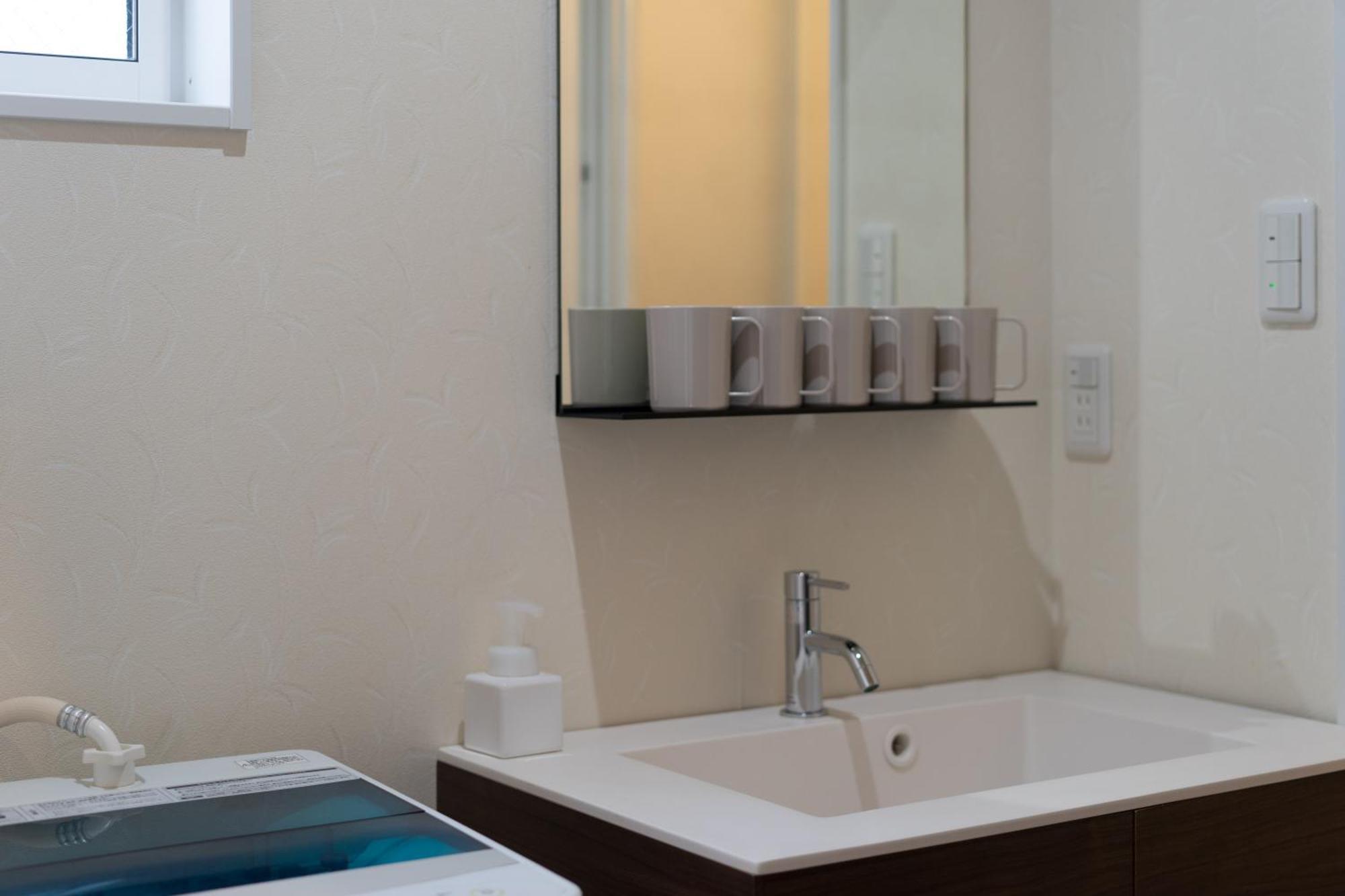 Guesthouse Zennichi Киото Номер фото